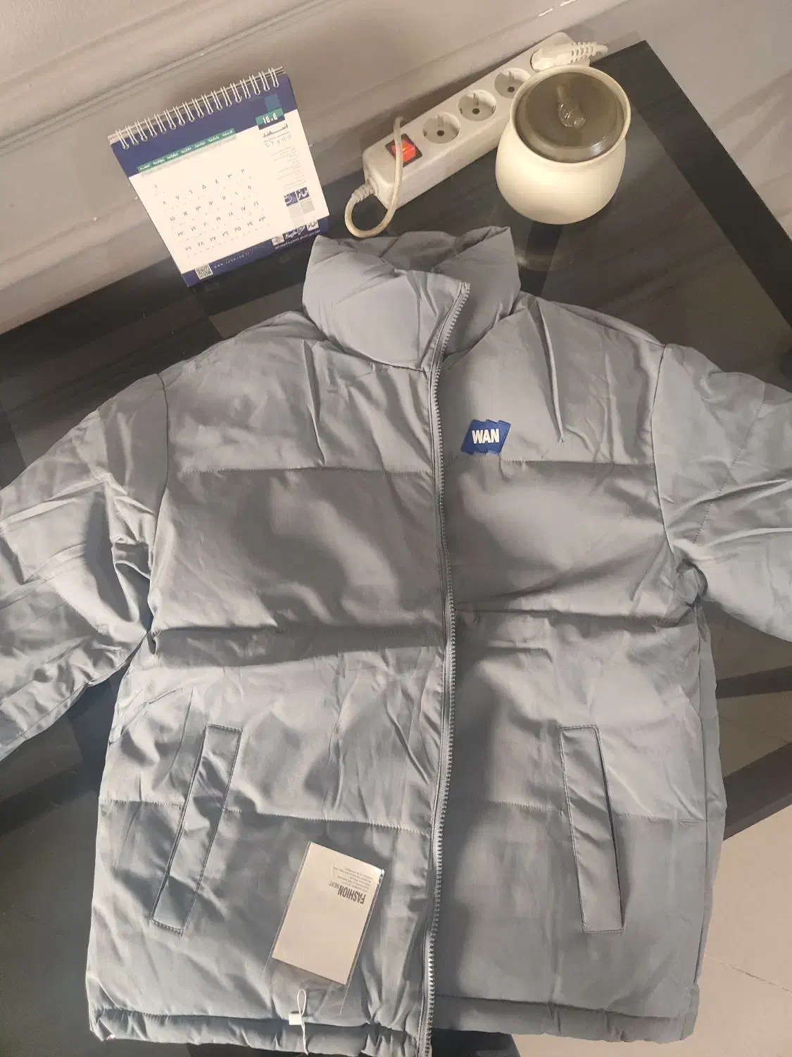 کاپشن|لباس|مشهد, فتح المبین|دیوار