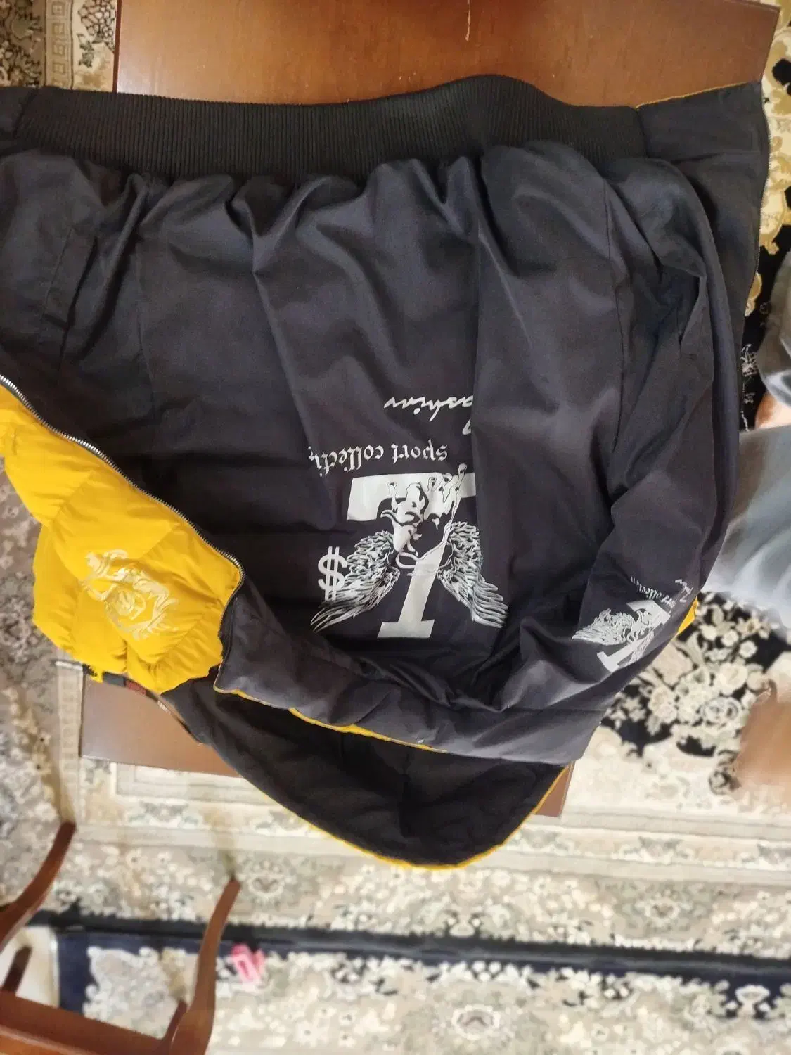 کاپشن|لباس|زنجان, |دیوار