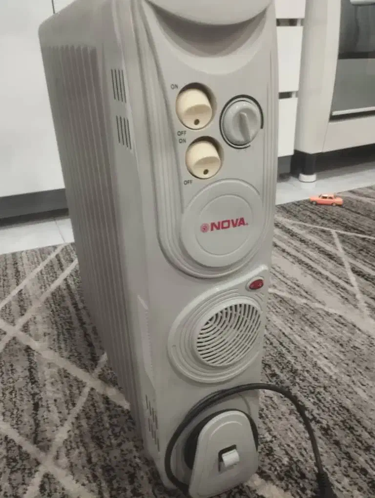 بخاری برقی. شوفاژ و رادیاتور برقی.|بخاری، هیتر، شومینه|محمدیه-قزوین, |دیوار