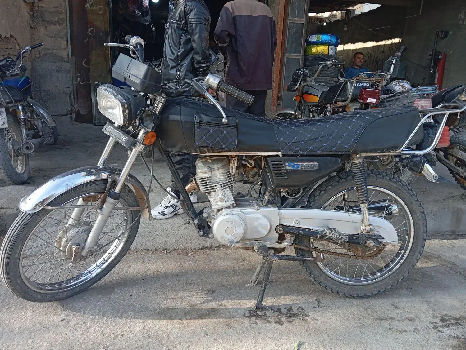 موتور سیکلت|موتورسیکلت|مرودشت, نقش رستم|دیوار