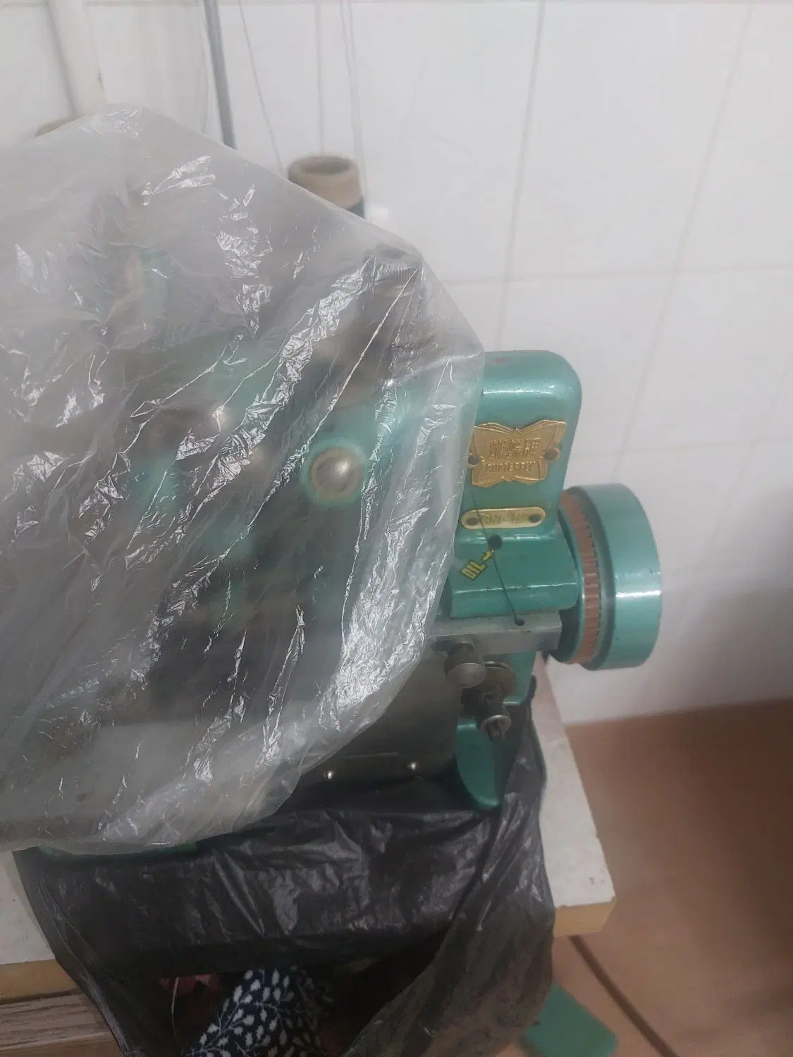 سر دوز|چرخ خیاطی و ریسندگی|شیروان (خراسان), |دیوار