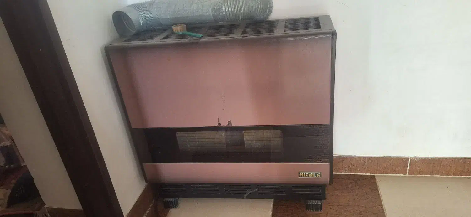 دو عدد بخاری سالم|بخاری، هیتر، شومینه|دوگنبدان, |دیوار