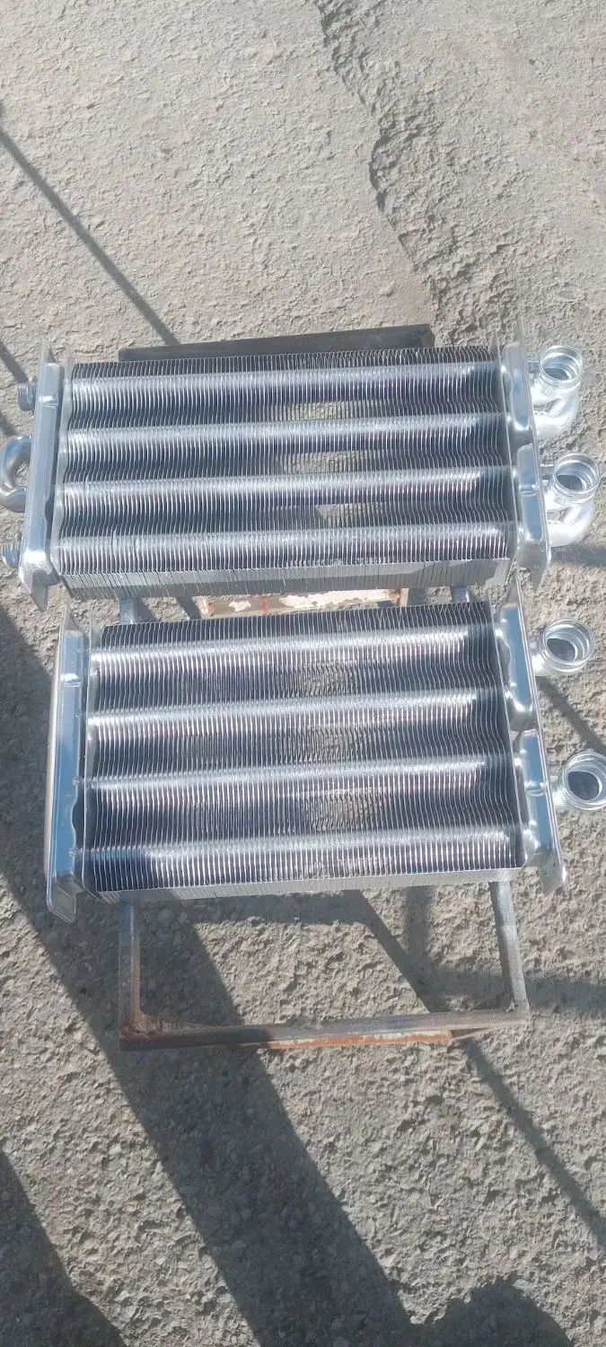 تعمیر انواع مبدل های ایرانی وخارجی|آبگرمکن، پکیج، شوفاژ|سنندج, |دیوار