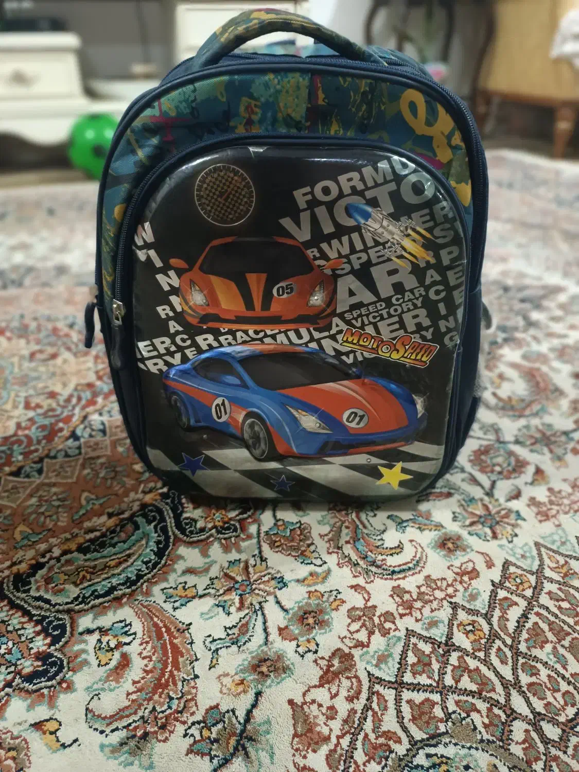 کوله پشتی چراغ دار مدرسه|کیف، کفش، کمربند|رشت, کوی قدس|دیوار