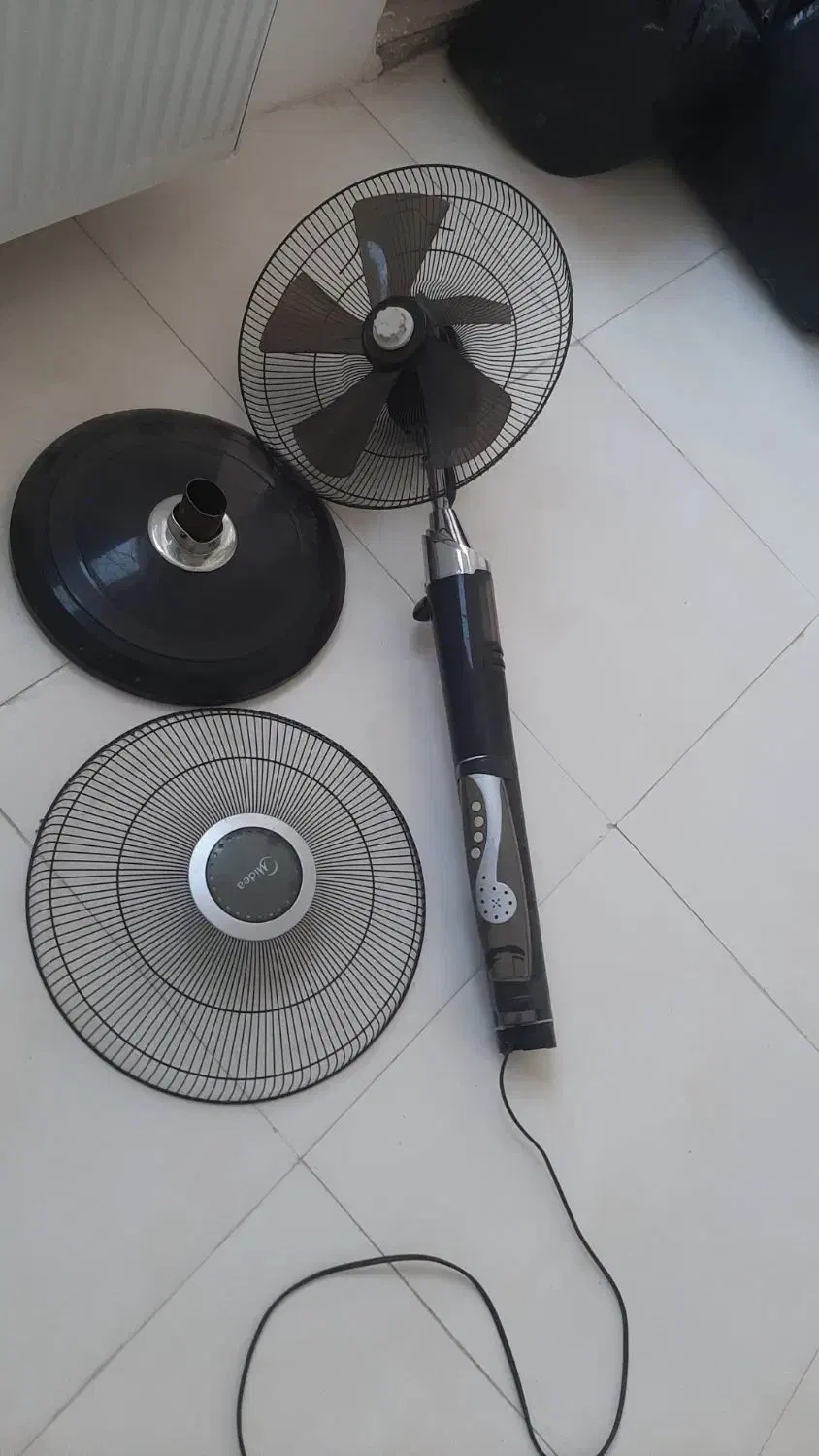 پنکه از پایه شکسته|پنکه و تصفیه‌کنندهٔ هوا|قزوین, |دیوار