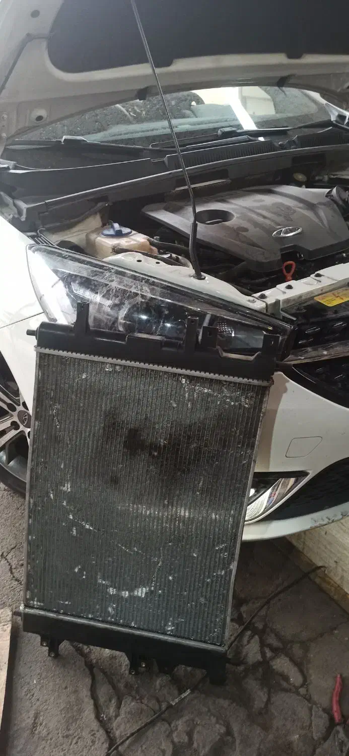 رادیاتور و اگزوز به همراه نصب و تعویض|قطعات یدکی و لوازم جانبی|قرچک, پارس سرام|دیوار