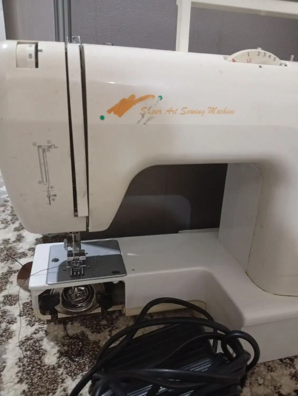 چرخ خیاطی|چرخ خیاطی و ریسندگی|تربتحیدریه, ده پائین|دیوار