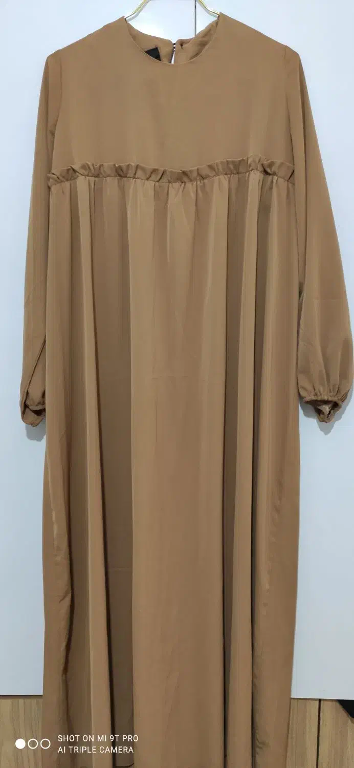 عبا کاملا نو|لباس|مشهد, شهید آوینی|دیوار