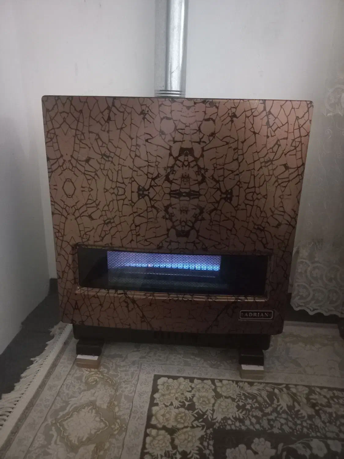 بخاری۱۲ هزار آدریان.درحد نو|بخاری، هیتر، شومینه|آستانه اشرفیه, |دیوار