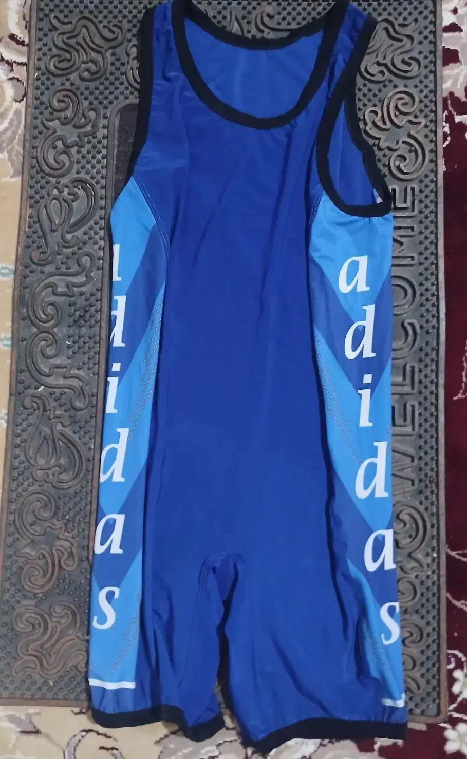 لباس کشتی|لباس|کبودرآهنگ, |دیوار