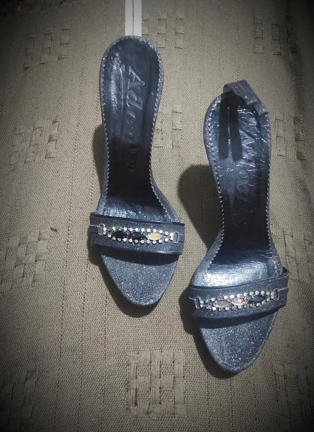 کفش مجلسی|کیف، کفش، کمربند|شیراز, لب آب|دیوار