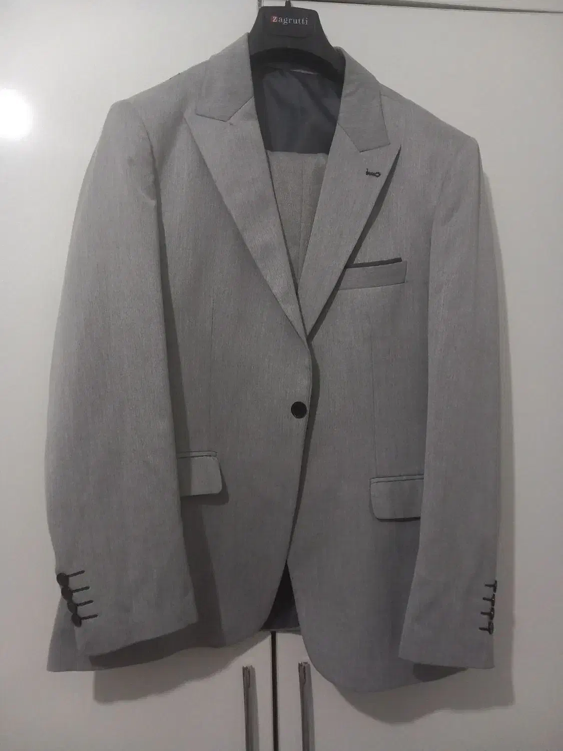 کت و شلوار نونو|لباس|قدس, شهر‌قدس|دیوار