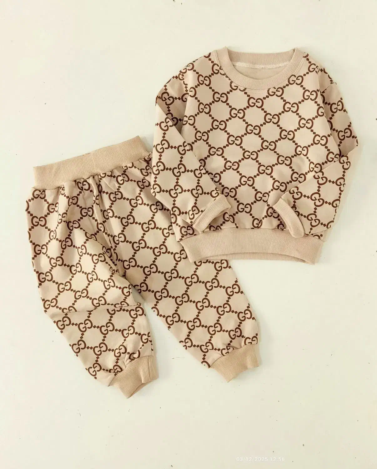 لباس نوزادی و کودک|کفش و لباس بچه|دوگنبدان, |دیوار