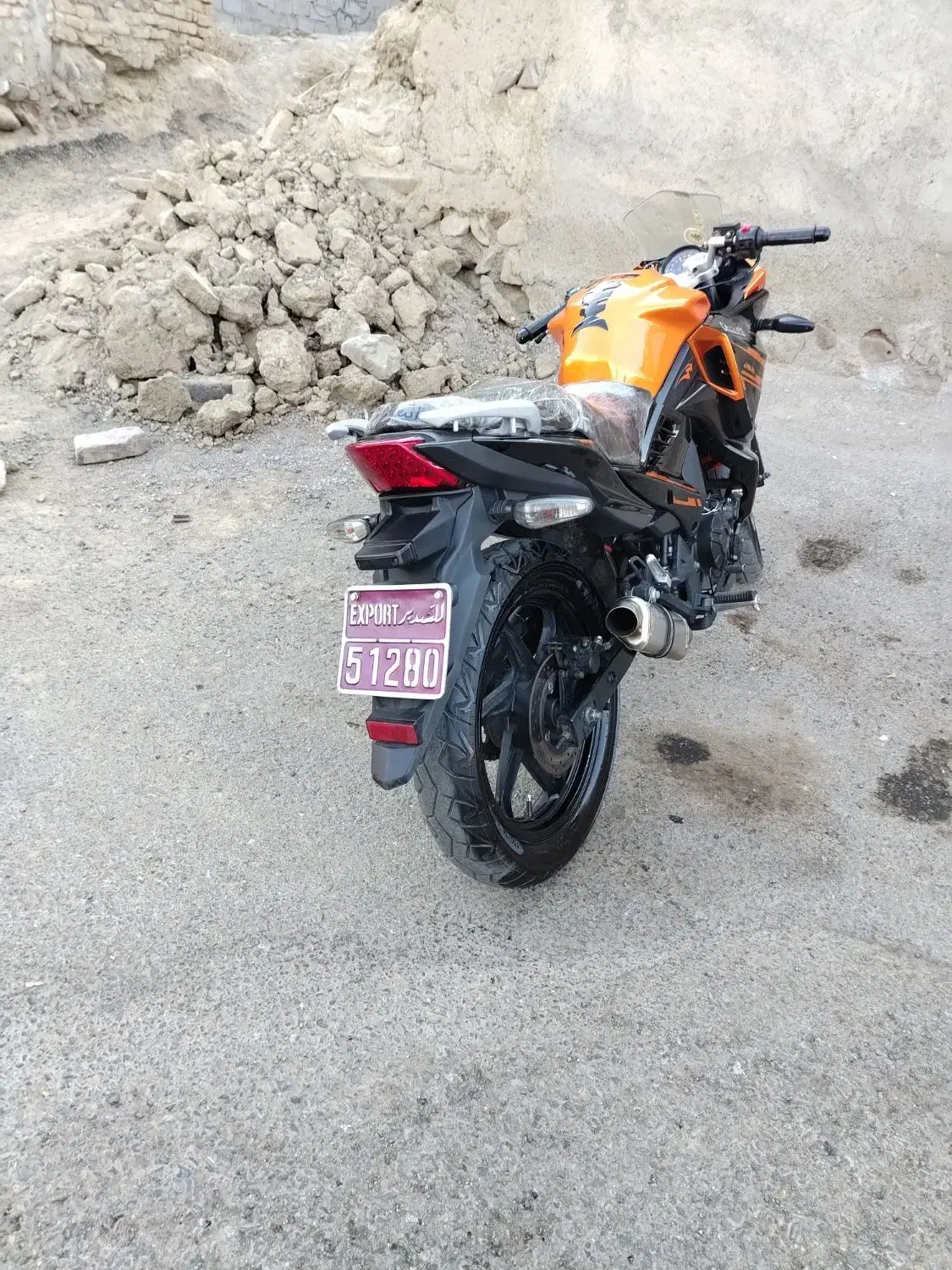 مگلی نارنجی استسنایی|موتورسیکلت|تربتحیدریه, سرمحله|دیوار