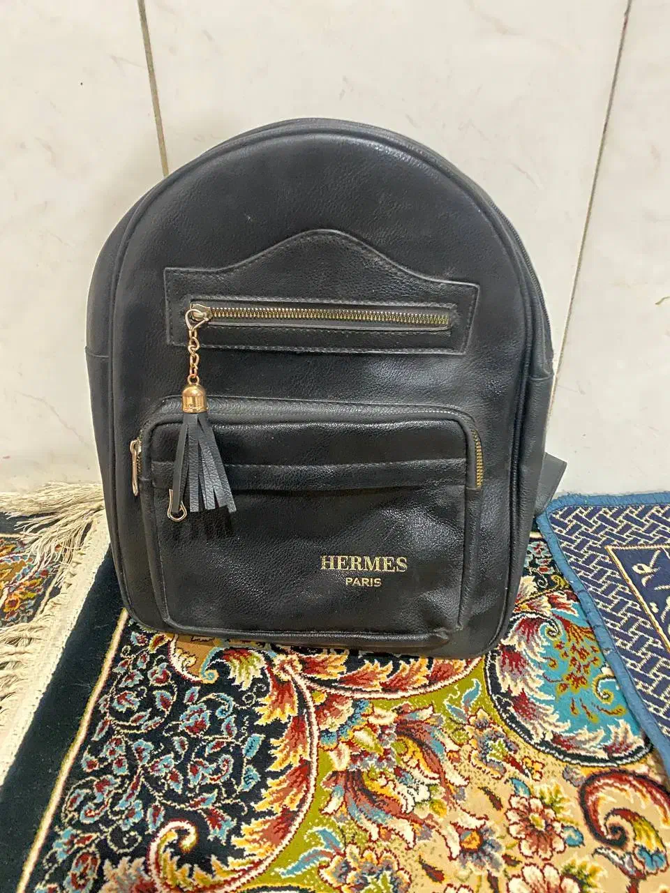 کیف|کیف، کفش، کمربند|نیشابور, بنیاد شهید|دیوار