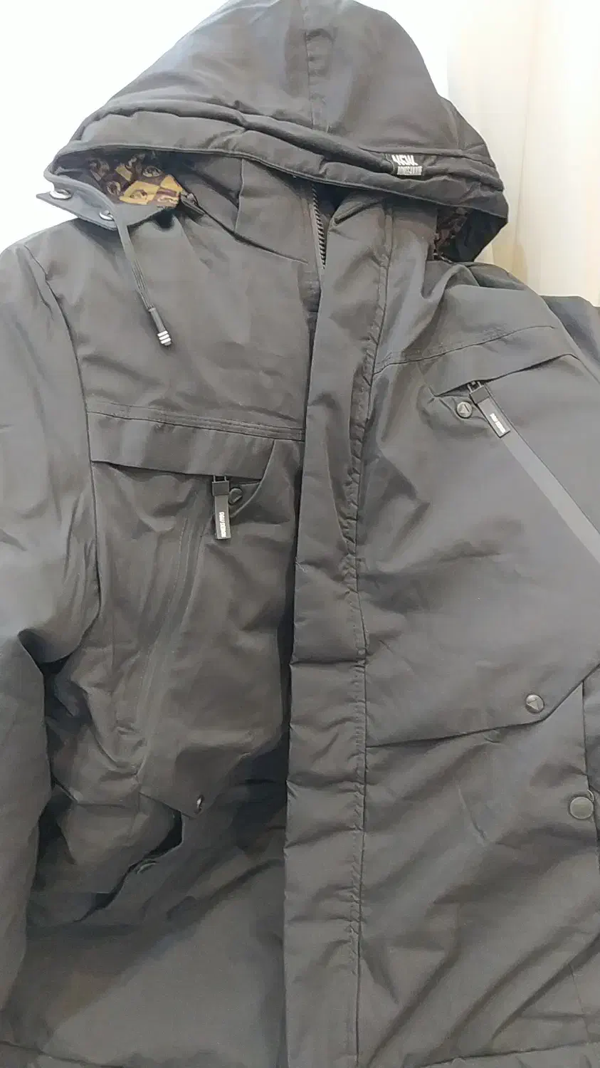 کاپشن|لباس|اراک, |دیوار