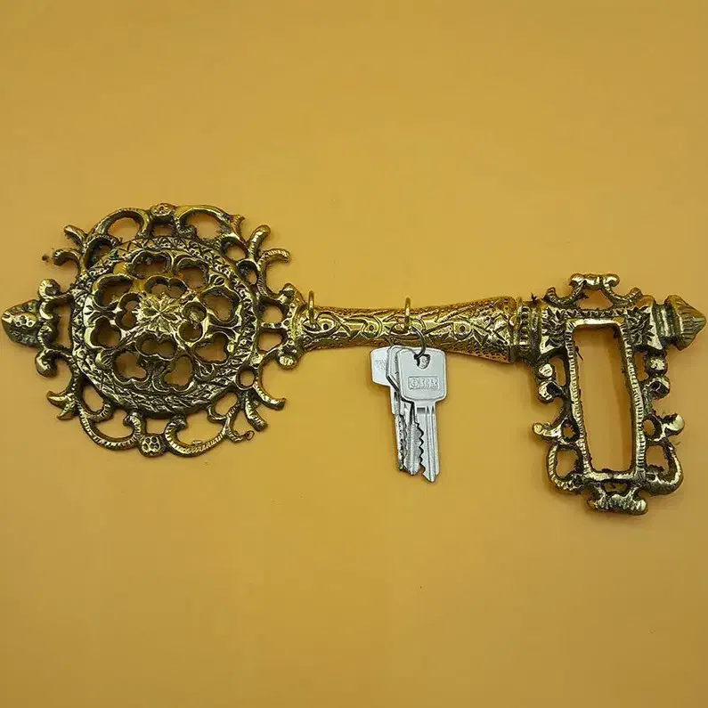 جاکلیدی برنزی طرح کلید .|مجسمه، تندیس، ماکت|نسیم‌شهر, |دیوار