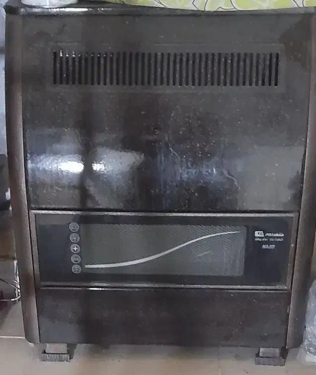 بخاری شهرک رامین.|بخاری، هیتر، شومینه|باوی, |دیوار