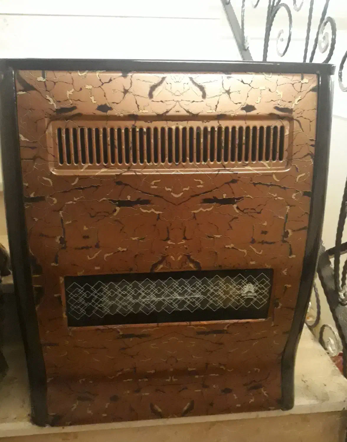 بخاری هیتا شعله ۹۰۰۰|بخاری، هیتر، شومینه|بندر انزلی, زنبق|دیوار