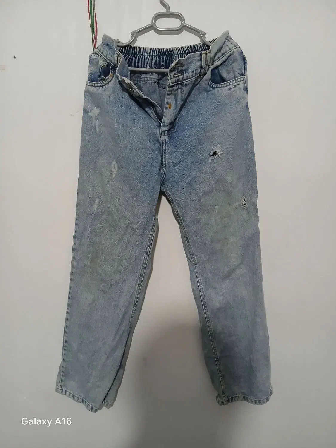 شلوار|لباس|کنگاور, |دیوار