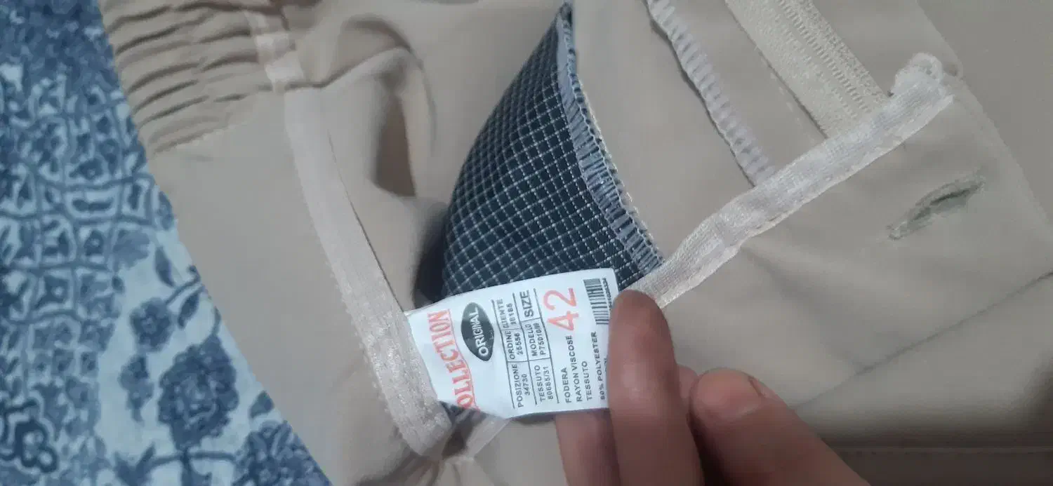 تعدادی شلوار|لباس|قم, نیروگاه|دیوار