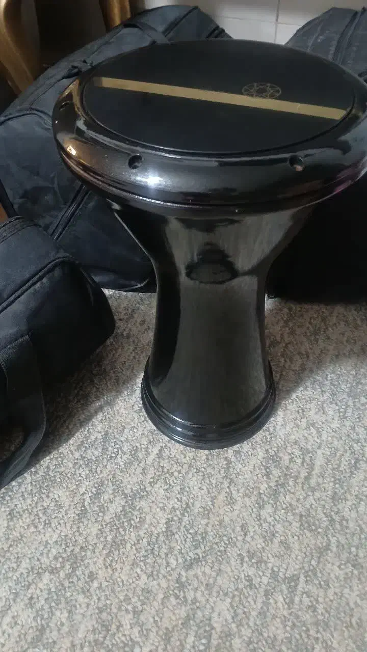 تبک تمپو|سازهای سنتی|شیراز, شهرک مهرگان|دیوار