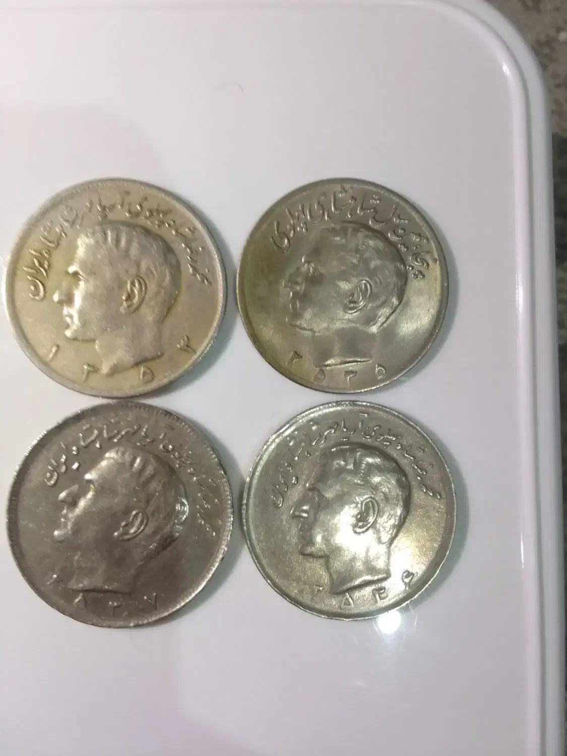 تعدادی سکه قدیمی پهلوی|کلکسیون سکه، تمبر، اسکناس|بروجرد, |دیوار