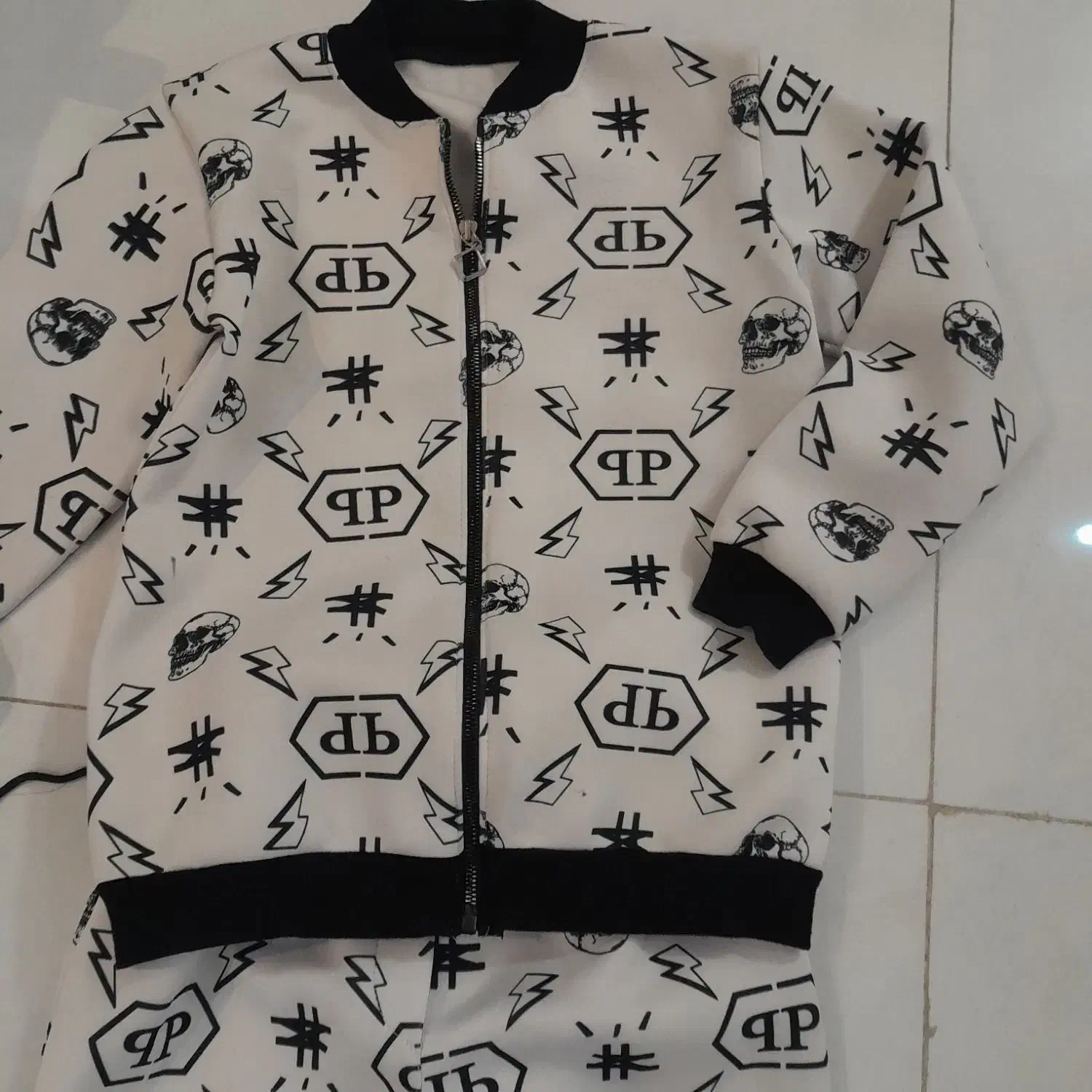 ست بچگانه|کفش و لباس بچه|رشت, معلم|دیوار