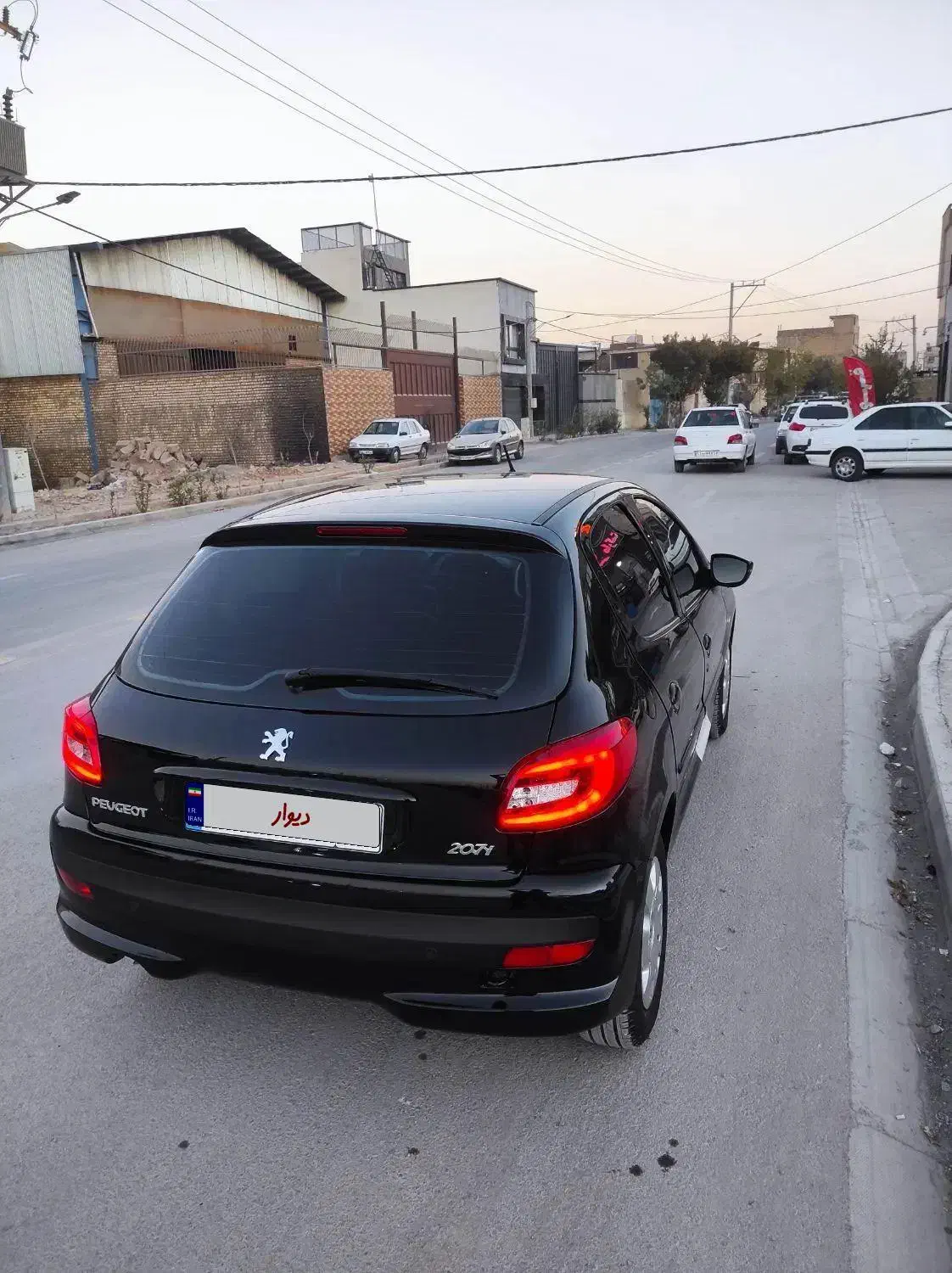 207مشکی سقف فلز هیدرولیک مدل 1404|خودرو سواری و وانت|اصفهان, برازنده|دیوار