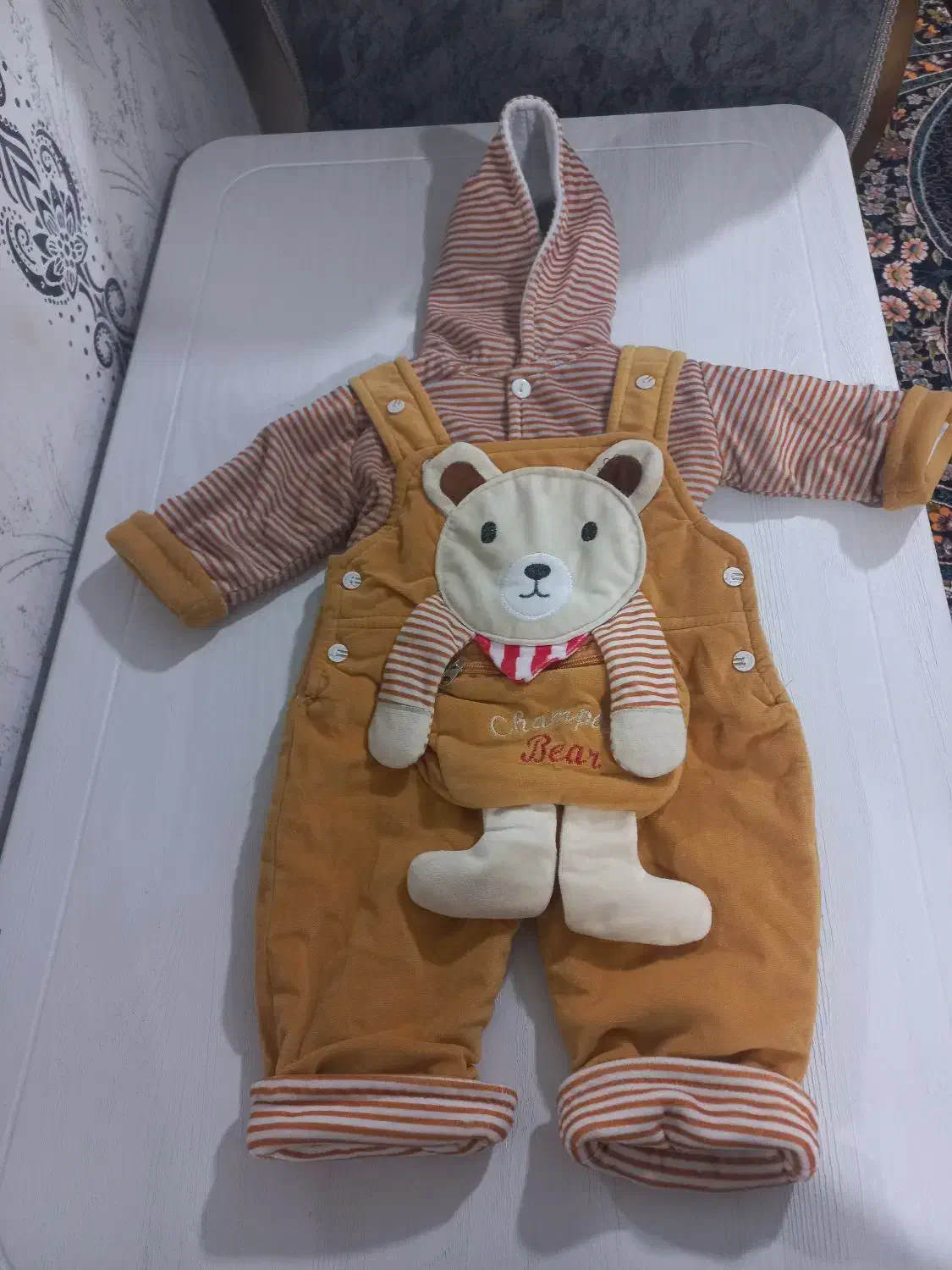 لباس بچه|کفش و لباس بچه|رشت, نخودچر|دیوار