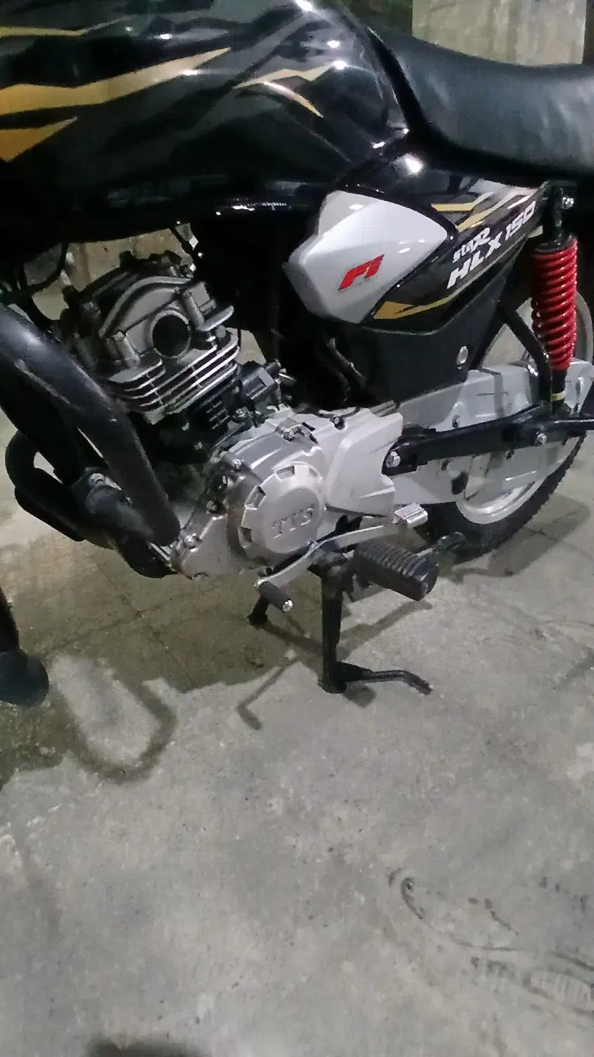 tvs hlx 1404|موتورسیکلت|ری, شهادت|دیوار