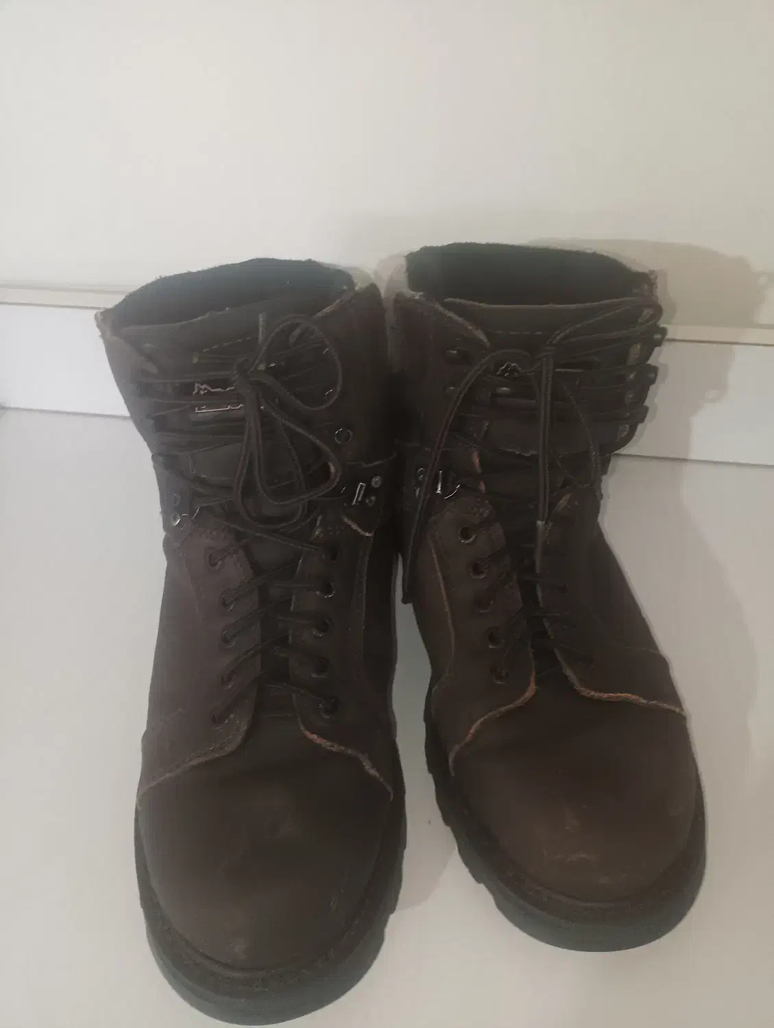 پوتین راکی|کیف، کفش، کمربند|شیروان (خراسان), |دیوار