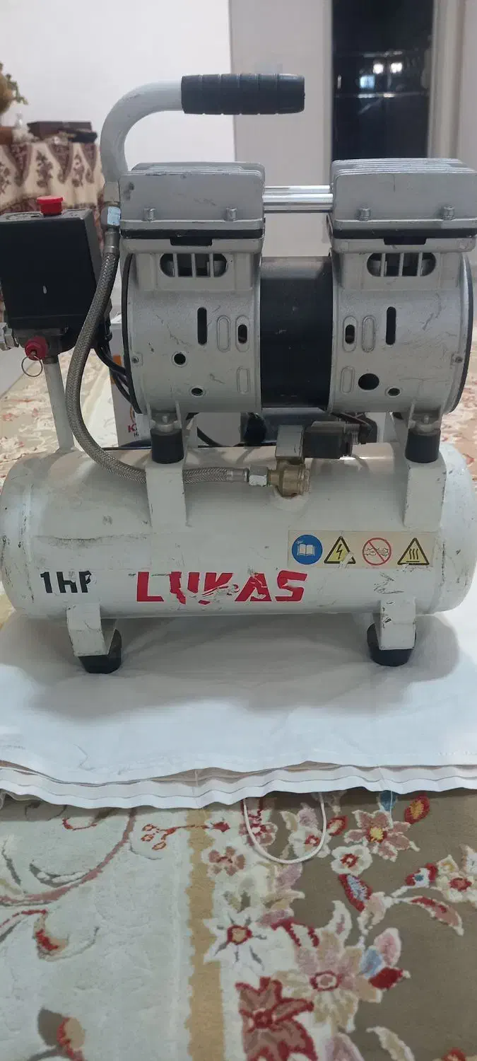 تراز لیزری و پمپ باد ۱۰لیتری|حراج|کلیبر, |دیوار