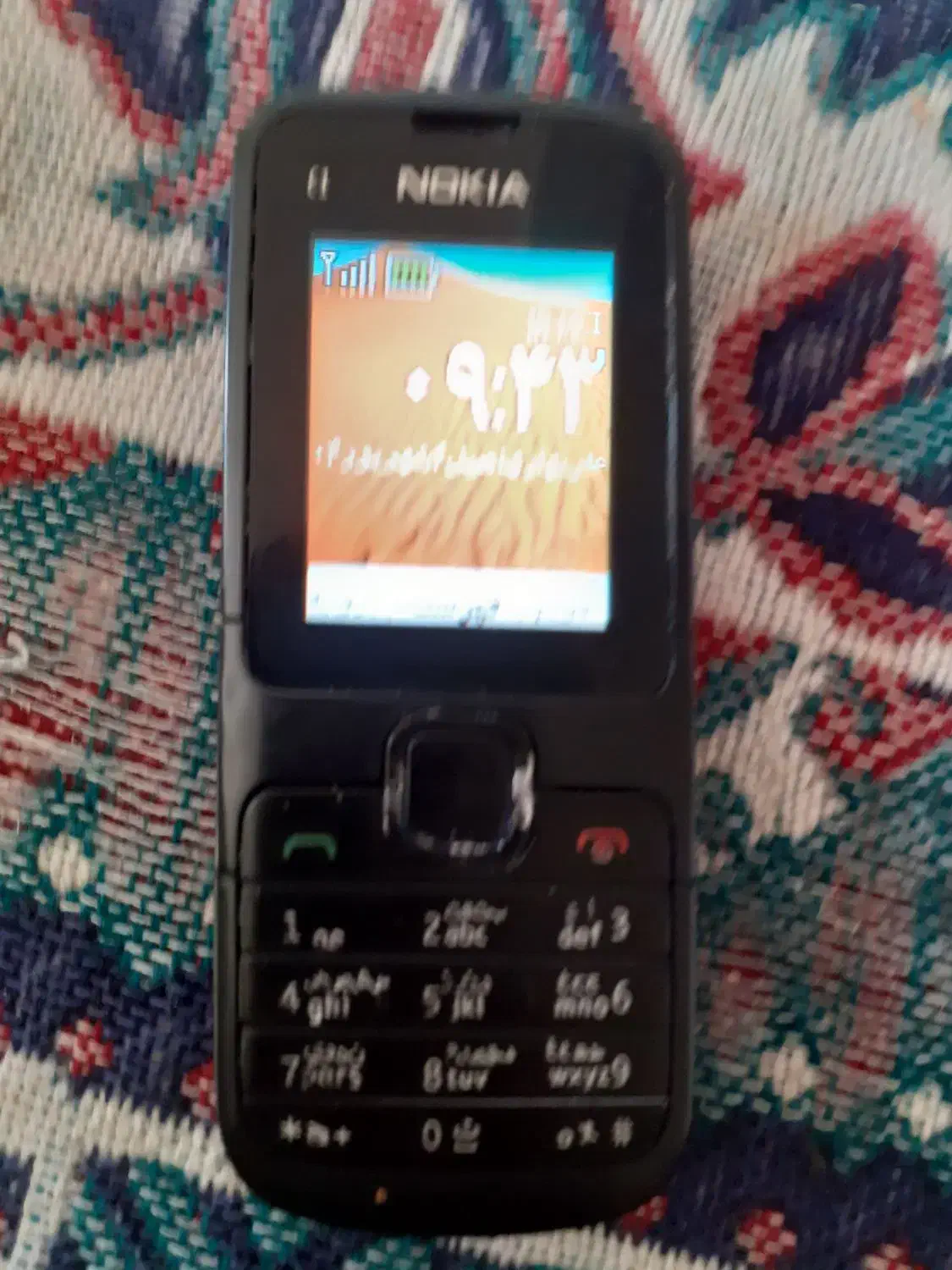 گوشی دوربین دار|موبایل|رباط‌کریم, رباط‌کریم|دیوار