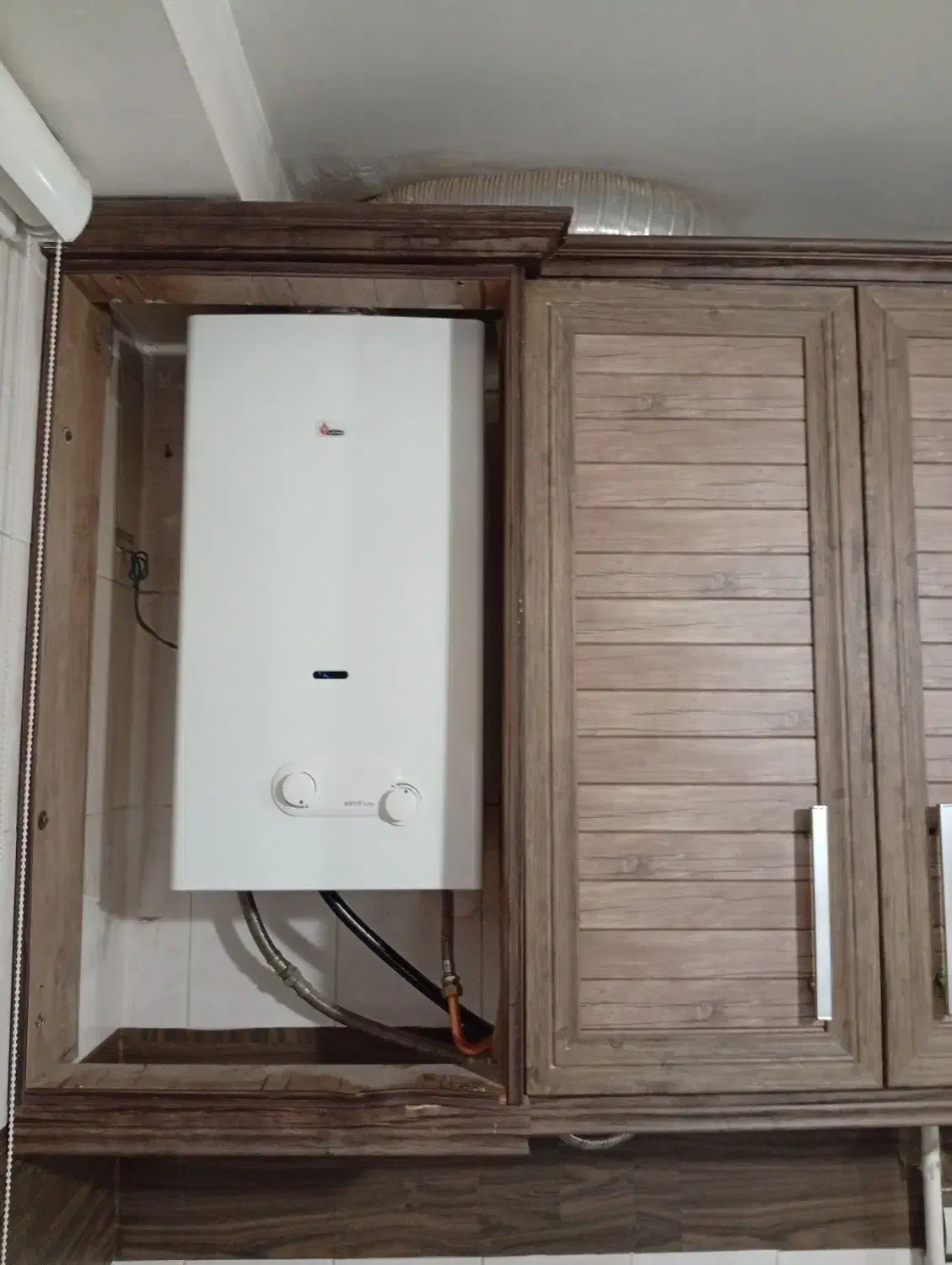 تعویض آبگرمکن دیواری بوتان 3115 turbo نو با کهنه|آبگرمکن، پکیج، شوفاژ|قزوین, |دیوار