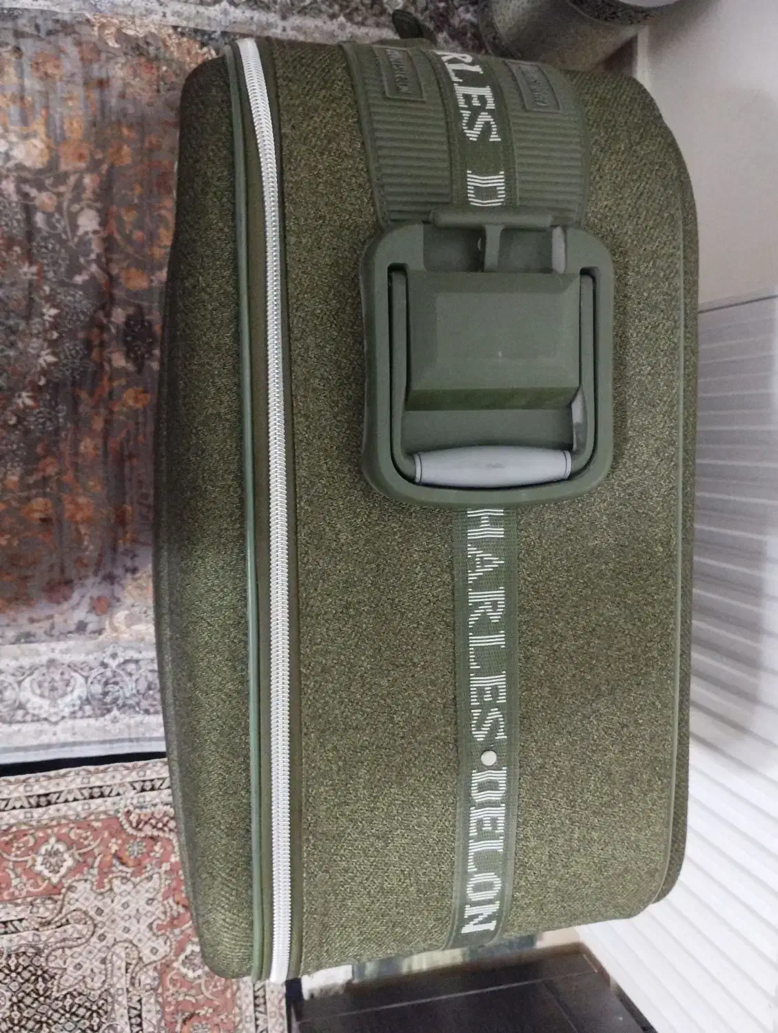 ساک بزرگ مسافرتی|کیف، کفش، کمربند|مهاجران, |دیوار