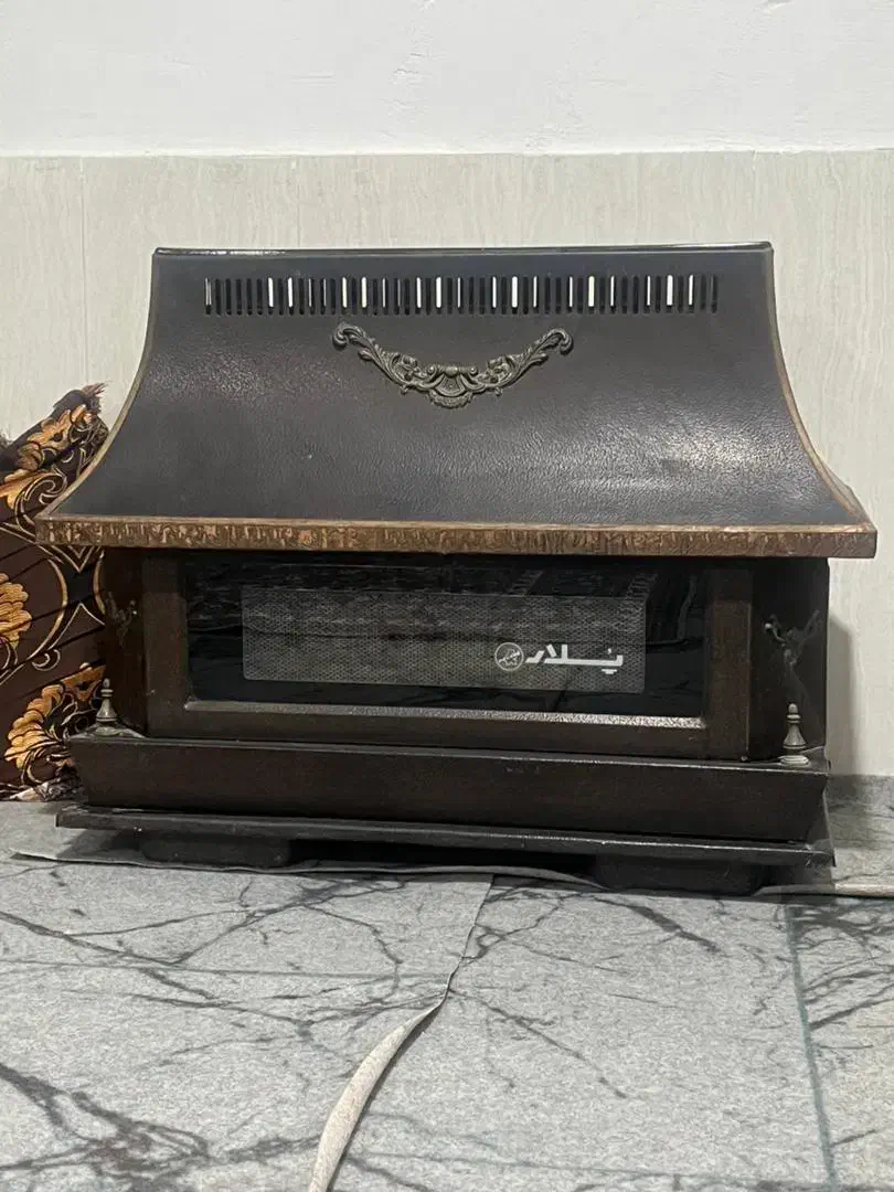 میز نهارخوری و بخاری گازی|میز و صندلی غذاخوری|بندر کنگان, |دیوار