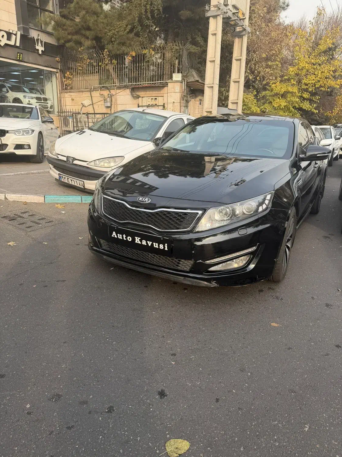 اپتیما ۲۰۱۳مشکی فول|خودرو سواری و وانت|تهران, درختی|دیوار