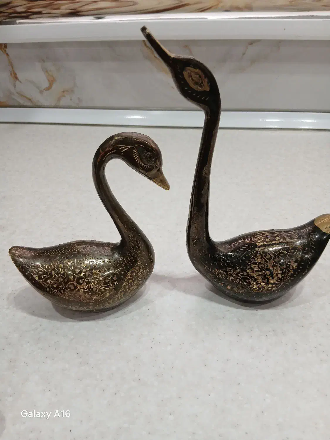 قوی عاشق برنزی|مجسمه، تندیس، ماکت|رباط‌کریم, نصیرشهر|دیوار