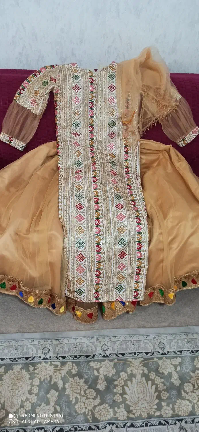 لباس محلی|لباس|مرودشت, استادیوم‎|دیوار