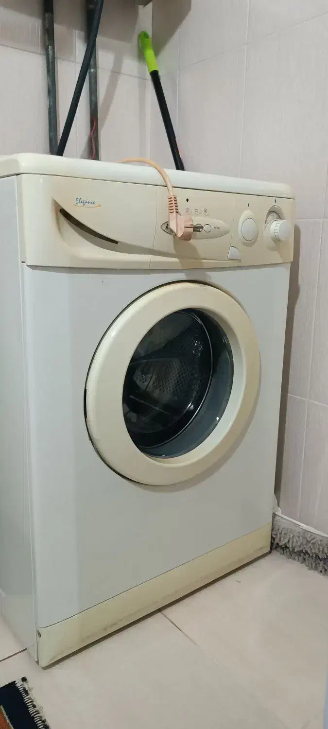 ماشین لباسشویی خشک کن|ماشین لباسشویی و خشک‌کن لباس|هشتگرد, گلسار|دیوار