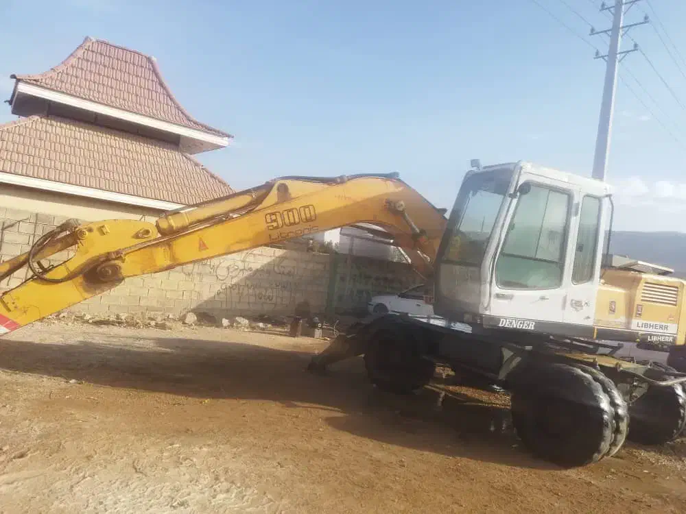 بیل میکانیکی چرخ لاستیکی|خودرو سنگین|بومهن, |دیوار