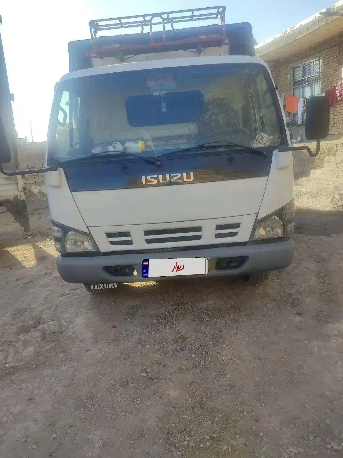 یک دستگاه خودرو ایسوزو|خودرو سنگین|پایین هولار, |دیوار