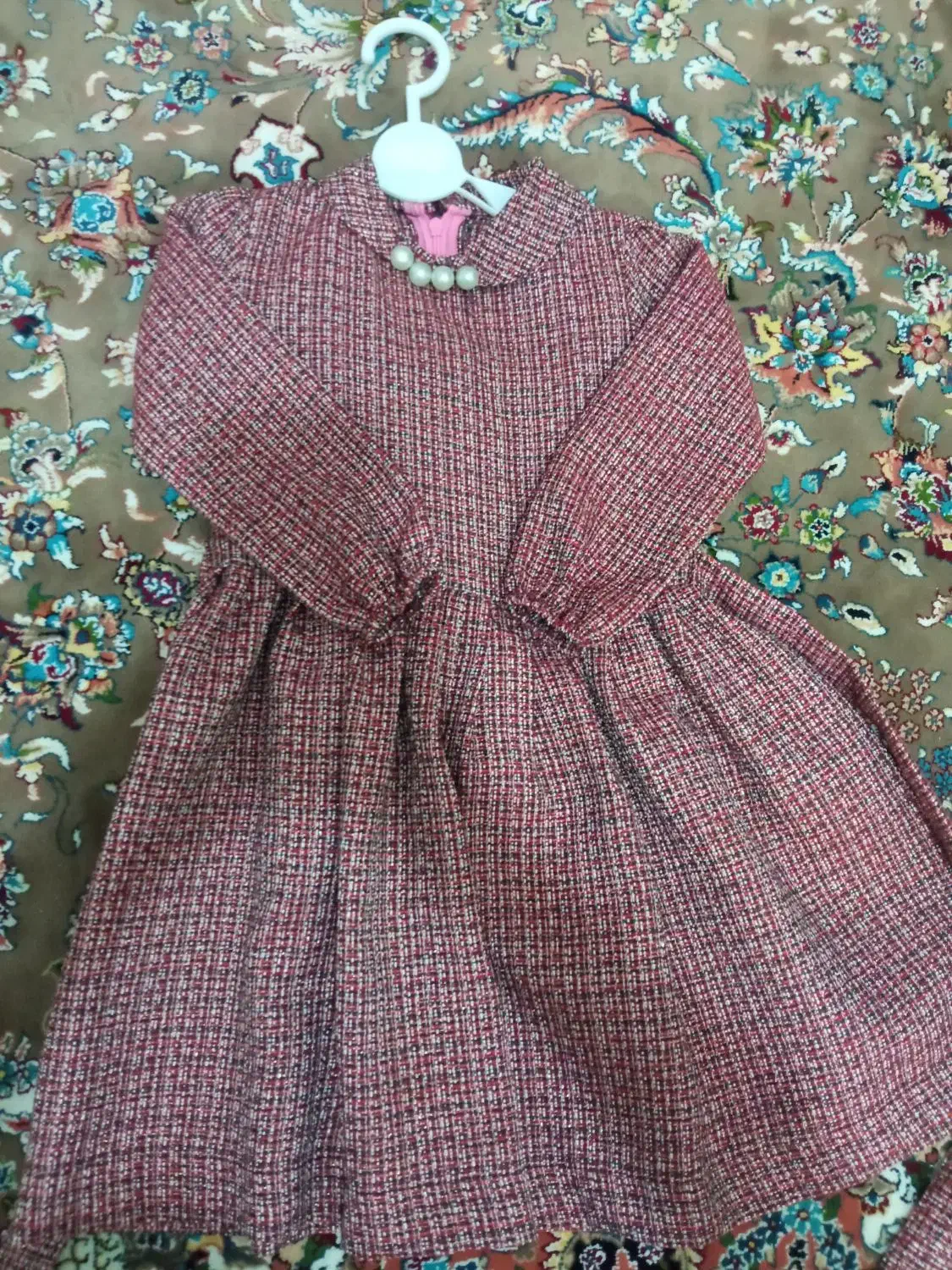 لباس بچه گونه|لباس|تربت جام, میرقوام الدین|دیوار