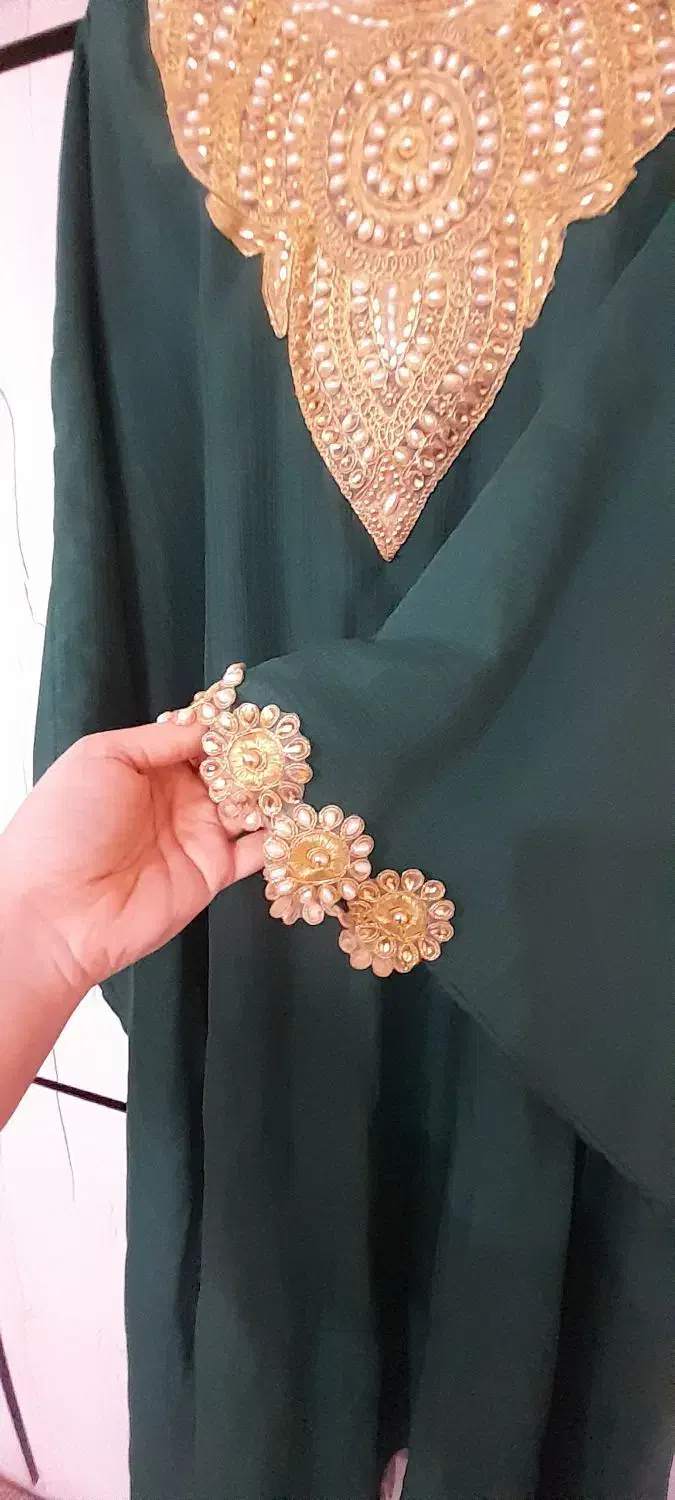 لباس خلیجی|لباس|شوش, |دیوار