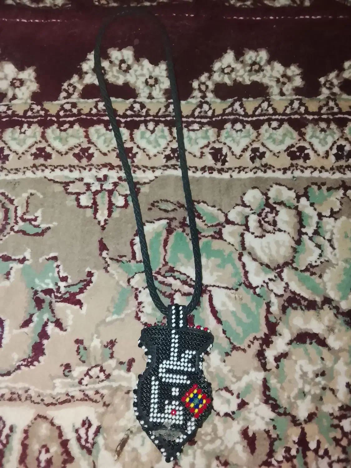 گردبند زندان بافت|جواهرات|زابل, |دیوار