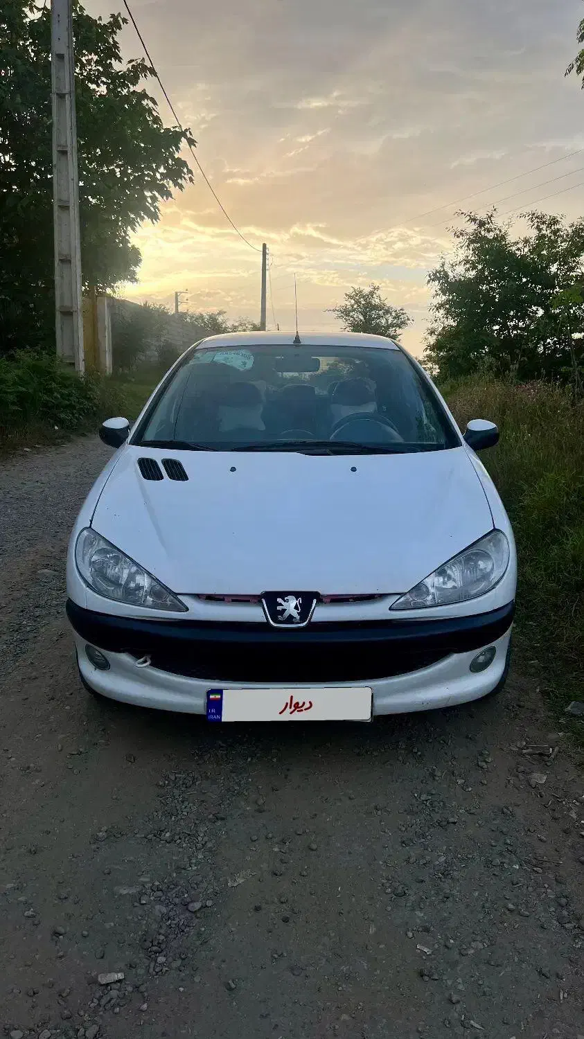 206tu5|خودرو سواری و وانت|لاهیجان, قیام|دیوار