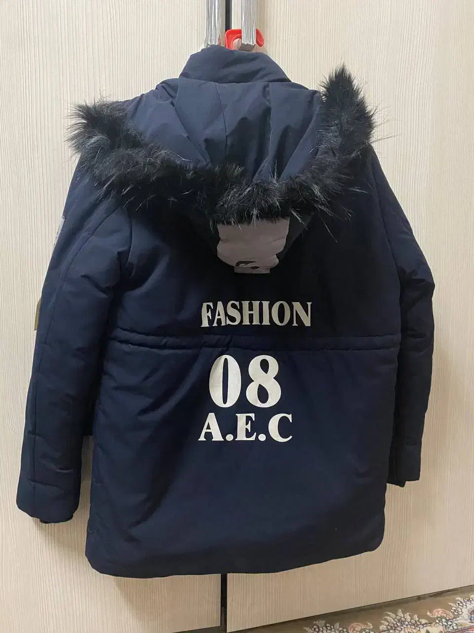 کاپشن|لباس|گنبد کاووس, |دیوار