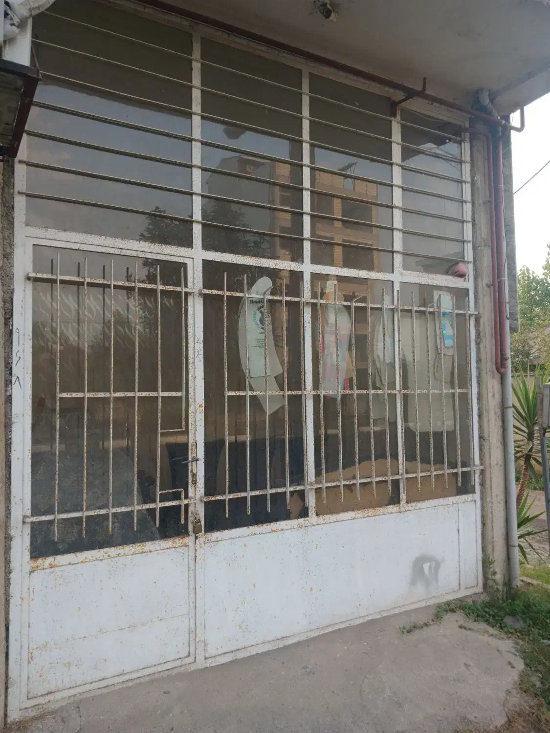 درب آهنی مغازه|مصالح و تجهیزات ساختمان|گوراب زرمیخ, |دیوار