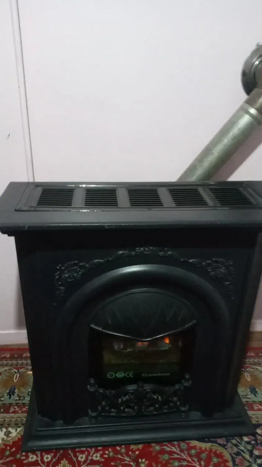 بخاری شومینه کاملا سالم|بخاری، هیتر، شومینه|تبریز, |دیوار